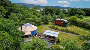 Yurt glamping among the trees at Nyth Robin